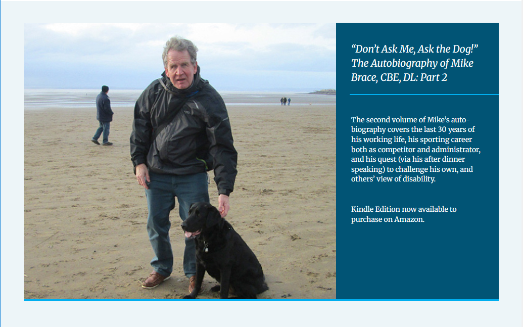 cover page of Mike's 2nd autobiography book showing Mike on the beach with his guide dog, Izzy